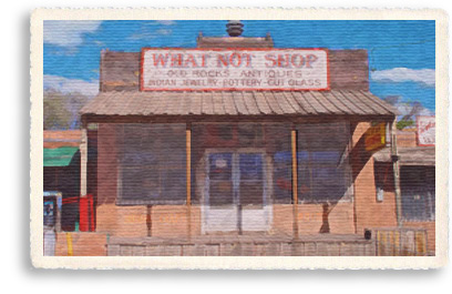 Quaint old adobe buildings still house businesses in Cerrillos, New Mexico. These authentic old adobes provide an excellent backdrop for many of the western movies still filmed here.